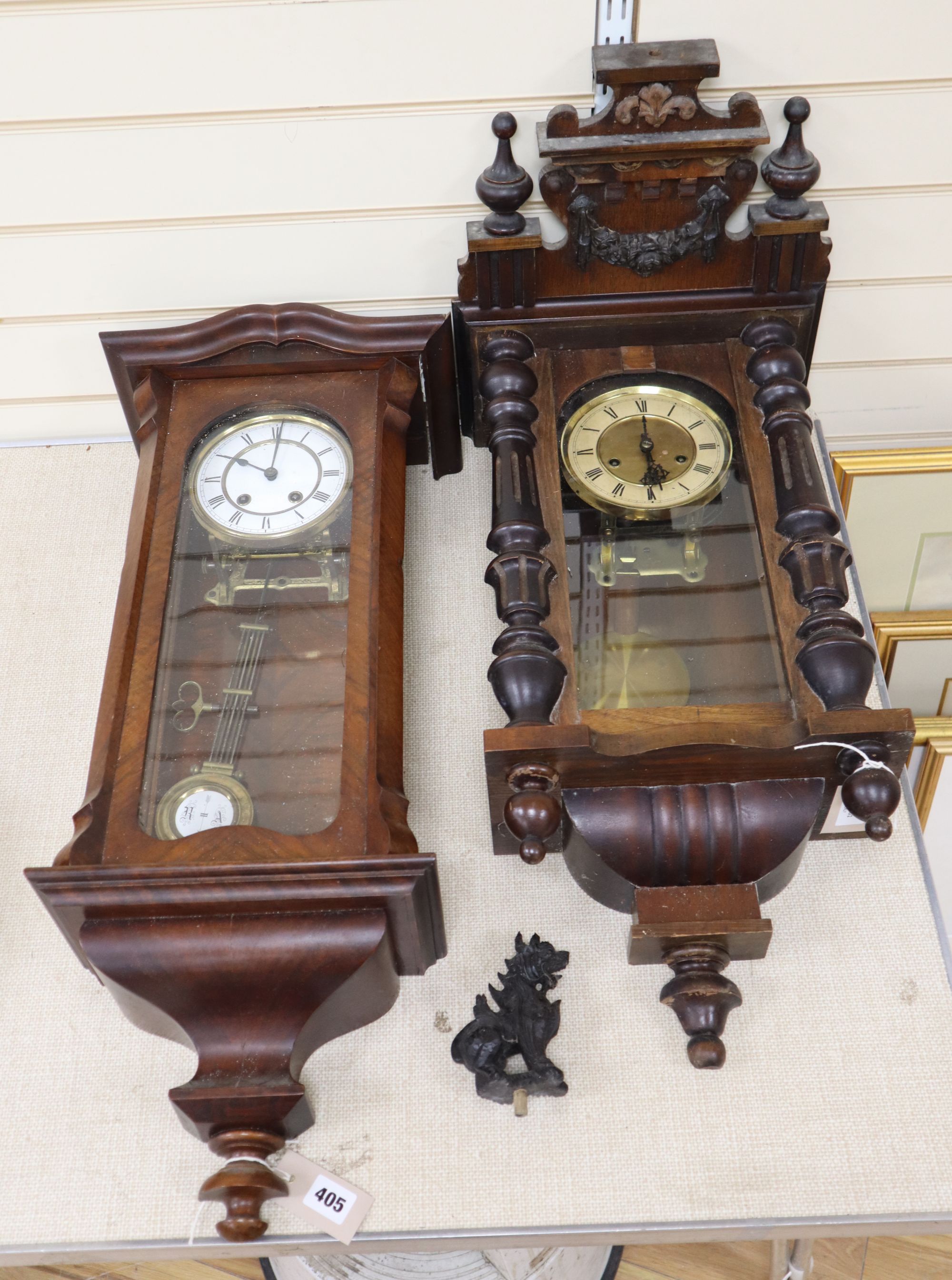 A walnut Vienna regulator with enamelled Roman dial and another regulator with carved pediment, largest 75cm